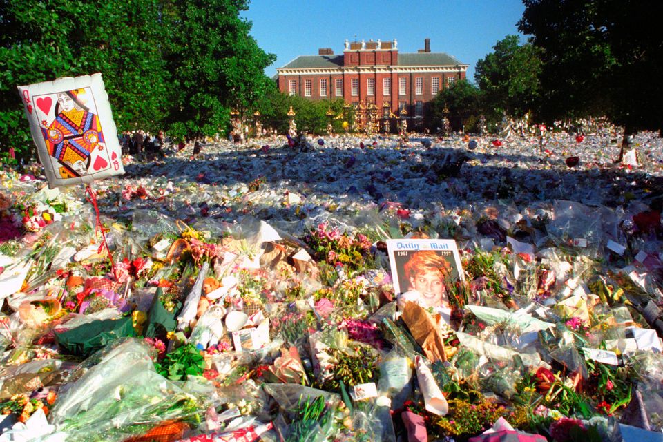 20 years on, flowers and tributes back at gates of Diana's palace