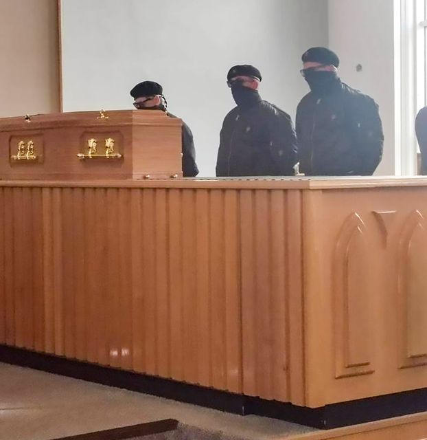 Masked men at the funeral of Andrew 'Andy' Best at Roselawn Crematorium