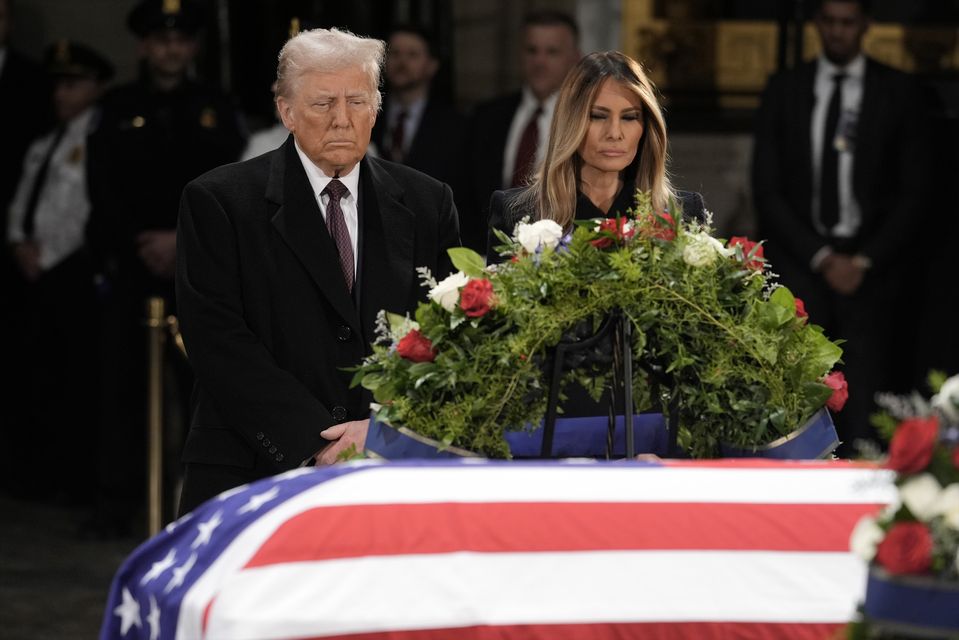 President-elect Donald Trump paid his respects at Mr Carter’s casket on Wednesday (J Scott Applewhite/AP)