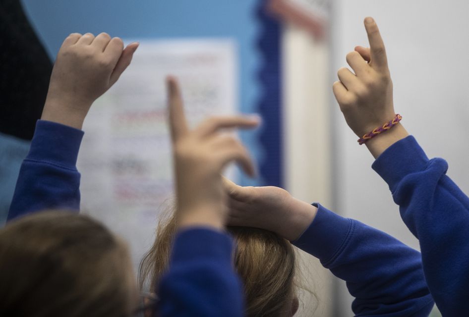 School children during a class (Danny Lawson/PA)