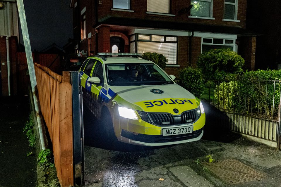 Police at the scene of the murder in east Belfast overnight. Photo: Kevin Scott