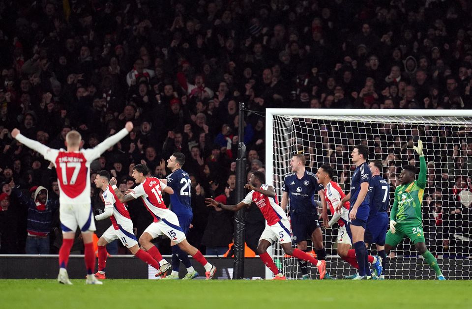 Jurrien Timber headed Arsenal in front against Manchester United (John Walton/PA)