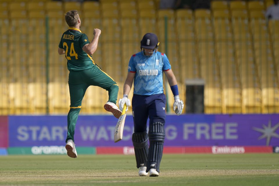 Wiaan Mulder celebrates the dismissal of Joe Root (Anjum Naveed/AP)