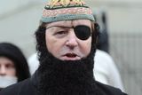 thumbnail: Loyalist  campaigner Willie Frazer arrives at Laganside Court  dressed up as radical Muslim cleric Abu Hamza for a  court appearance.  He is charged with six offences including one of encouraging or assisting offences by making a speech to flag protesters outside Belfast City Hall.
Pic Colm Lenaghan/Pacemaker
