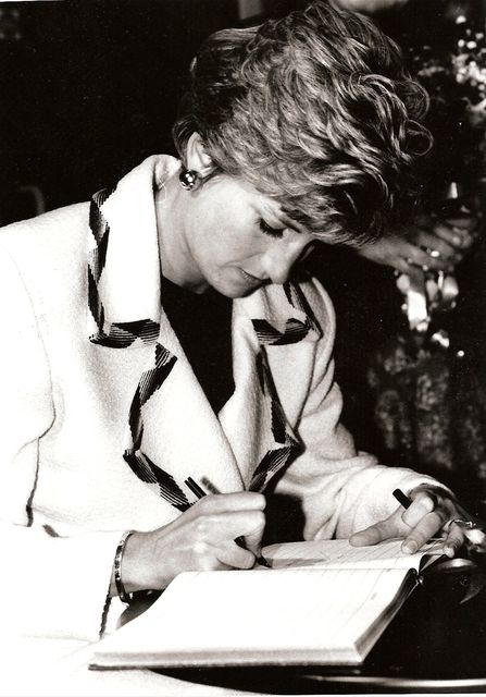 Princess Diana signs the visitor book at Appleby Social Education Centre in Armagh, November 1991