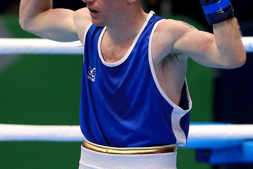 Northern Ireland's Paddy Barnes celebrates his victory against Papua New Guinea's Charles Keama. Pic Peter Byrne/PA Wire