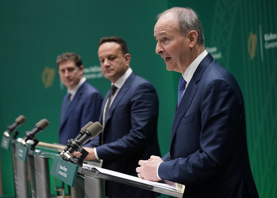 The then-leaders of the Greens, Fine Gael and Fianna Fail Eamon Ryan, Leo Varadkar and Micheal Martin (Niall Carson/PA)