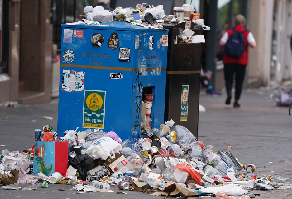 Waste and recycling workers in Glasgow City Council are among those set to strike in August (Andrew Milligan/PA)