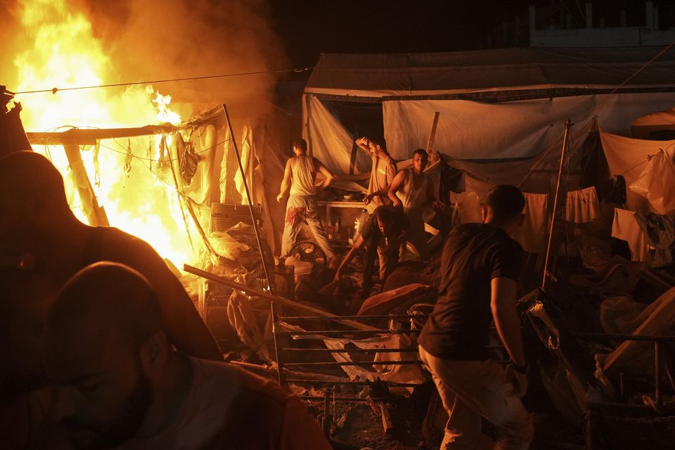 An Israeli strike on Sunday hit a tent area in the courtyard of Al Aqsa Martyrs hospital in Deir al Balah, Gaza Strip (AP)