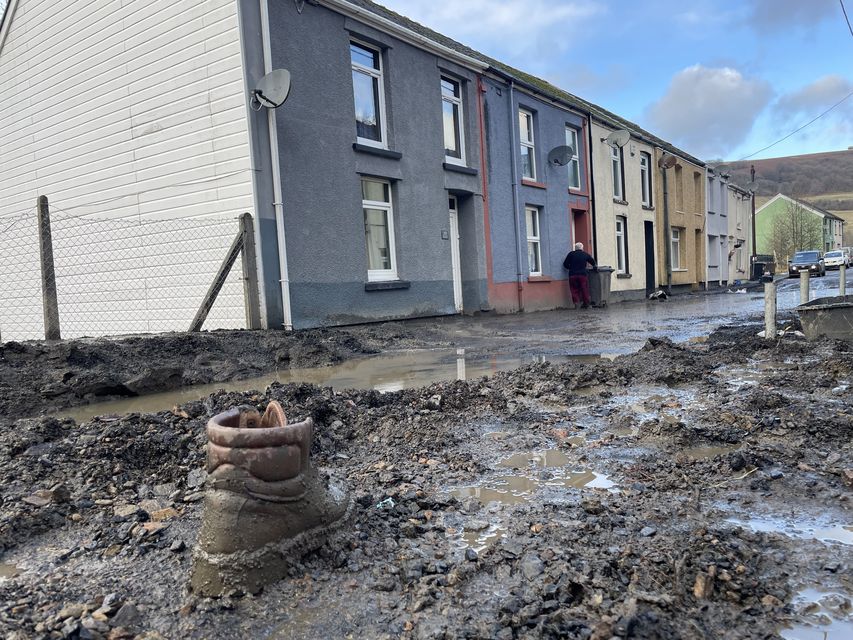 A boot abandoned in mud after the flooding in south Wales (George Thompson/PA)