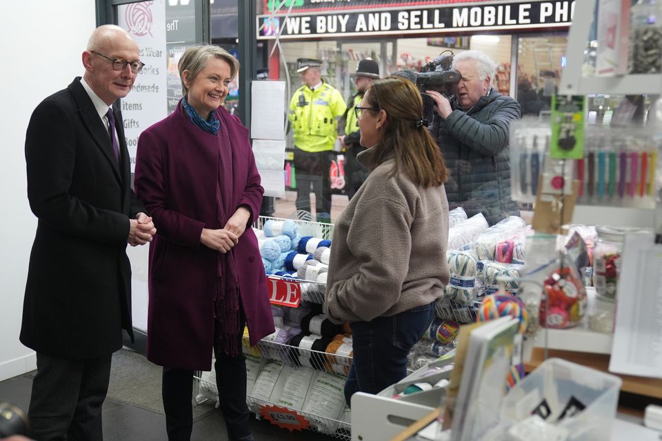 Yvette Cooper and Pat McFadden speak to retailers during a visit to Bilston in the West Midlands (Jacob King/PA)