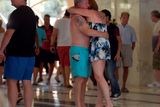 thumbnail: Tourists comfort each other after the mass shooting in the resort town of Sousse, a popular tourist destination 140 kilometers (90 miles) south of the Tunisian capital, on June 26, 2015. At least 37 people, including foreigners, were killed at a Tunisian beach resort packed with holidaymakers, in the North African country's worst attack in recent history. AFP PHOTO/FETHI BELAIDFETHI BELAID/AFP/Getty Images