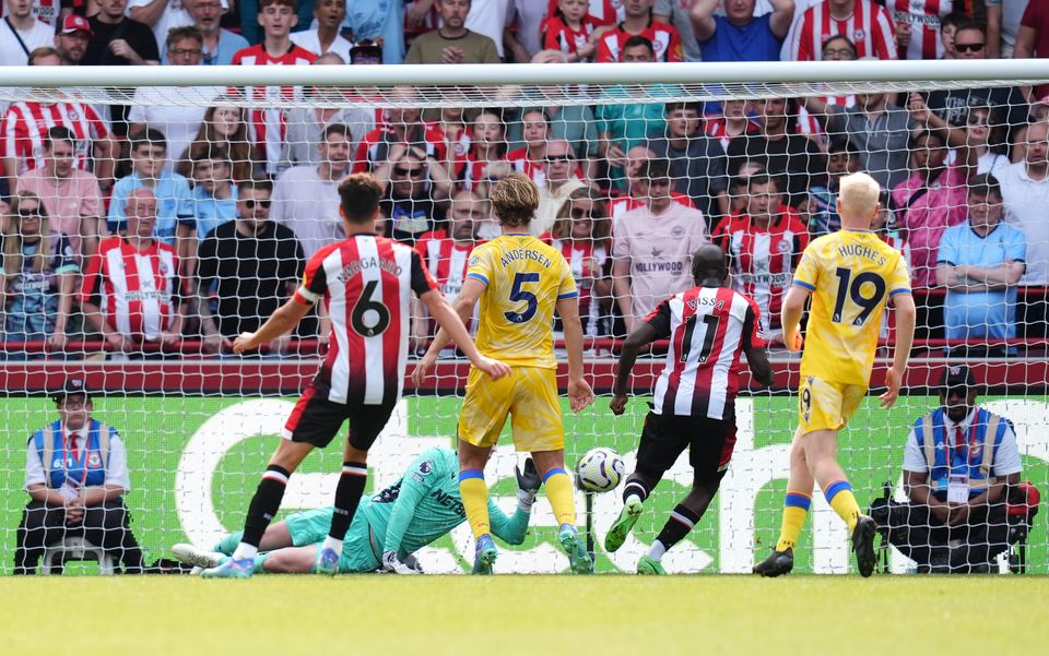 Yoane Wissa (second right) tucks home Brentford’s winner (John Walton/PA).