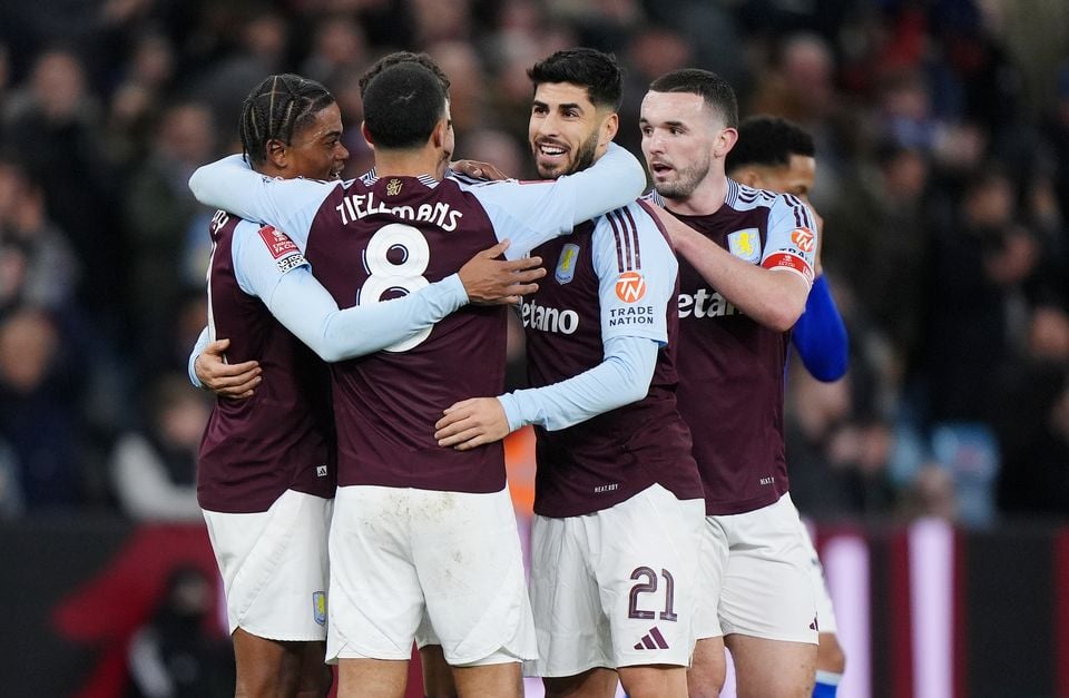 Marco Asensio (centre right) celebrates with team-mates (Bradley Collyer/PA)