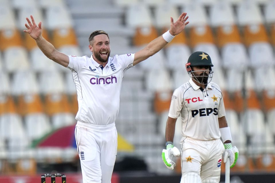 Chris Woakes celebrates taking a wicket (Anjum Naveed/AP)