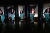 thumbnail: UTV Presenter Marc Mallett with Naomi Long (Alliance), Nigel Dodds (Deputy Leader of DUP) , Robin Swann (UUP) Michelle O'Neill (Sinn Fein) and Colun Eastwood (SDLP) during  A television debate from the five main parties which was recorded at UTV in Belfast. Pic Pacemaker