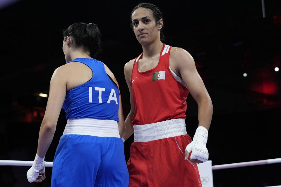 Imane Khelif (right) beat Angela Carini (AP Photo/John Locher)