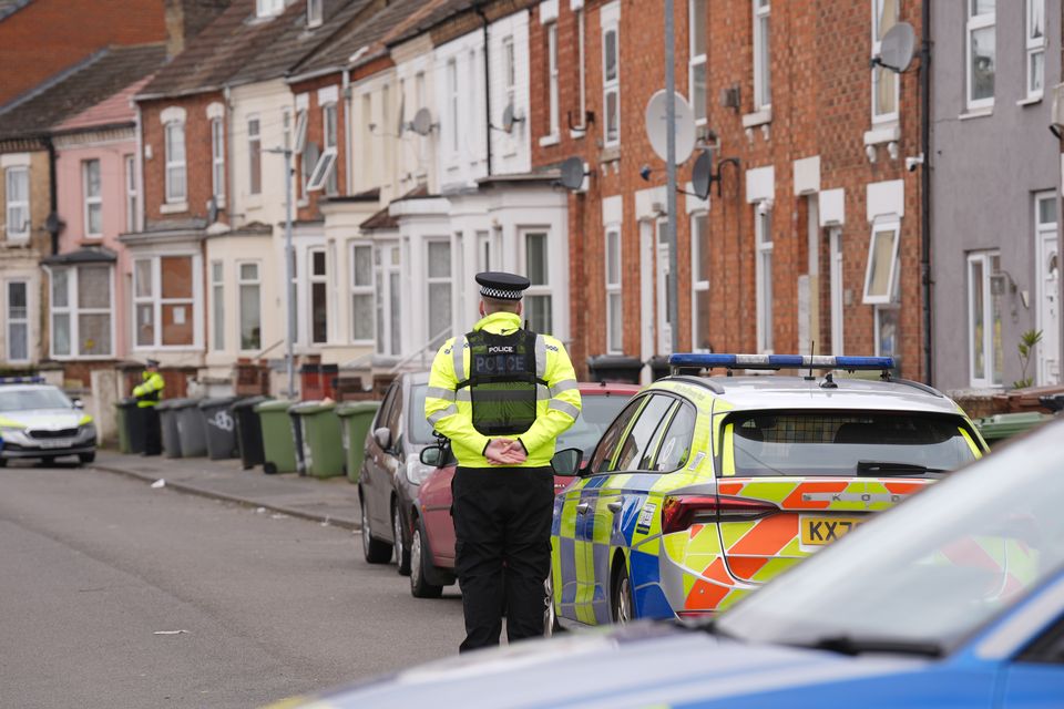 Police in Wellingborough’s Newcomen Road (Joe Giddens/PA)