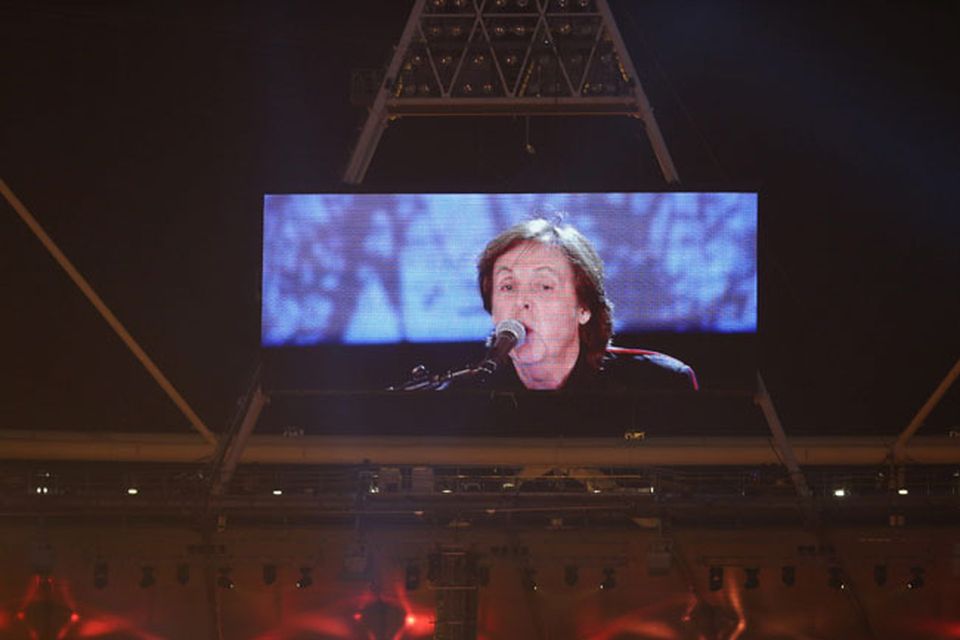 Paul McCartney is shown live on the big screens at the Opening Ceremony at the Olympic Stadium, London. PRESS ASSOCIATION Photo. Picture date: Saturday July 28, 2012. See PA story OLYMPICS Ceremony. Photo credit should read: Mike Egerton/PA Wire. EDITORIAL USE ONLY