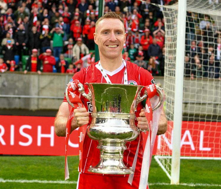 Chris Curran with the Irish Cup after his final game for Cliftonville
