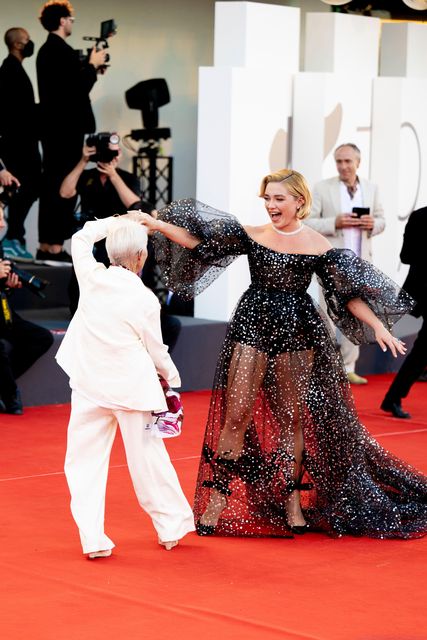 red carpet visible bra see through black dress Stock Photo - Alamy