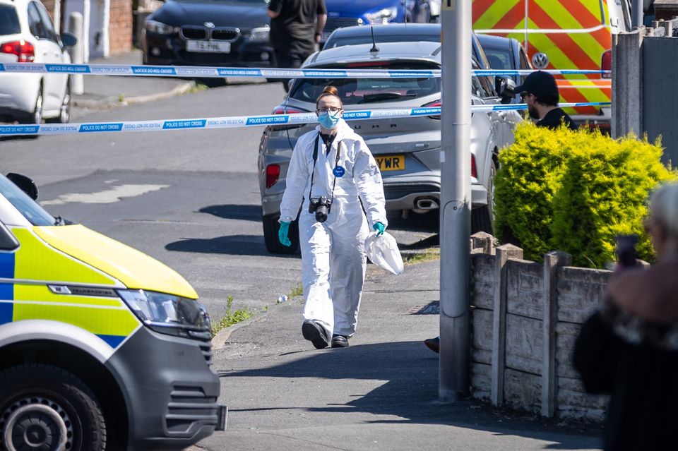 A police scenes-of-crime officer at the scene in Southport (James Speakman/PA)