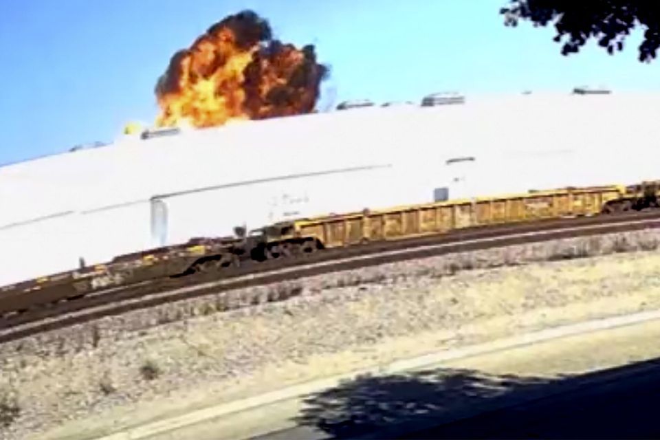 This image taken from video footage, shows an explosive fire as a small plane crashes into a commercial building in Fullerton (Rucci Forged/AP)