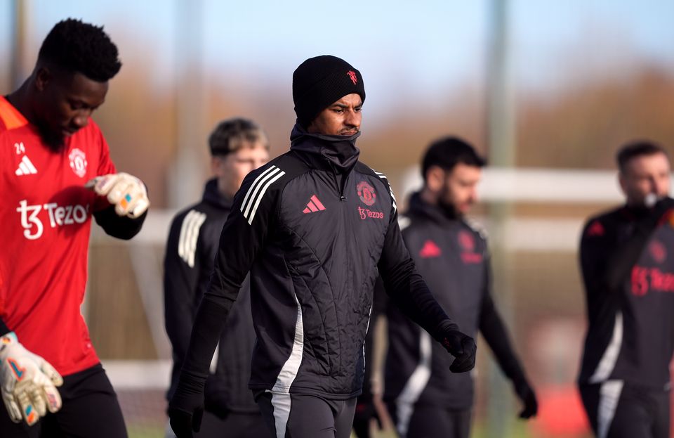 Marcus Rashford took part in training on Wednesday – but did not travel with the squad to Romania (Martin Rickett/PA)