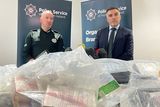 thumbnail: Newry, Mourne & Down District Commander Superintendent Norman Haslett (left) and Detective Chief Superintendent Andy Hill with a quantity of suspected cocaine seized in Co Armagh. Pic: Rebecca Black/PA