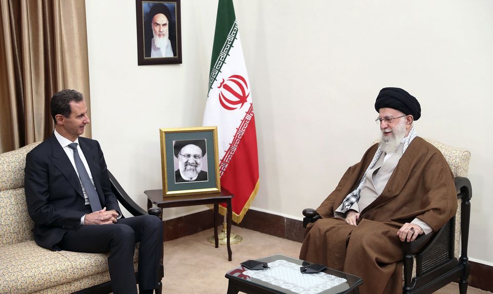 Bashar Assad meeting Iranian Supreme Leader Ayatollah Ali Khamenei in Tehran in May this year (Office of the Iranian Supreme Leader/AP)