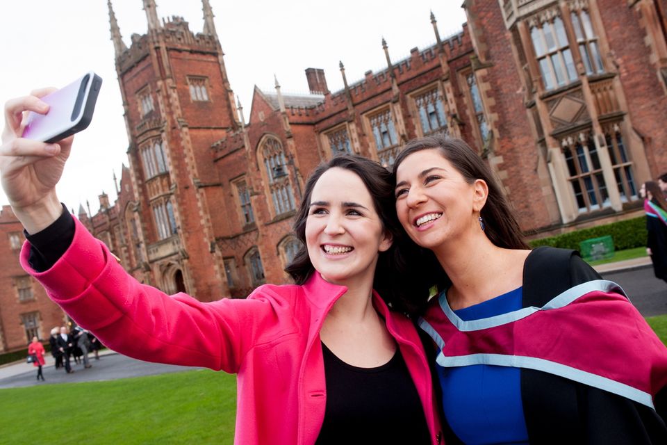 (L-R) Sisters Mary and Anne Marley from Portadown celebrate with a graduation selfie at Mary's graduation at Queen's University. Mary graduated with a MSc in Autism from Queens School of Education.