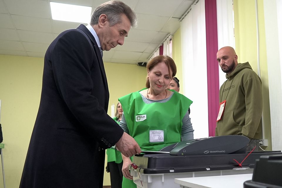 In this photo taken from video, Bidzina Ivanishvili, leader of the Georgian Dream party, votes at a polling station during the parliamentary election in Tbilisi, Georgia (Kostya Manenkov/AP)