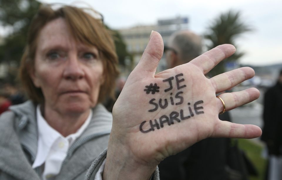 FILE – Brigitte Le Blein, of Nice, shows her hand reading ‘I am Charlie’ (Lionel Cironneau/AP)