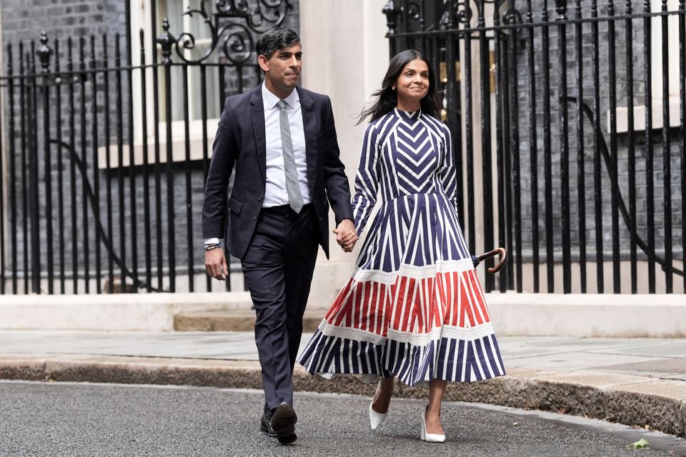 Rishi Sunak with his wife Akshata Murty (Stefan Rousseau/PA)