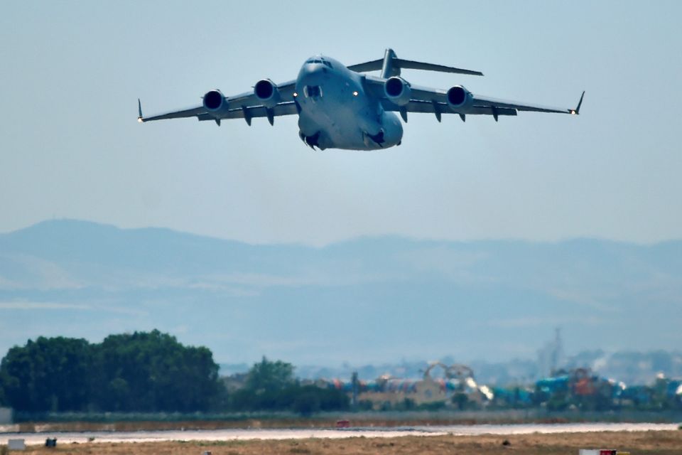 TUNIS, TUNISIA - JULY 01: An RAF C17 aircraft bound for Brize Norton takes off from Tunis Airport carrying the victims of last Friday's terrorist attack, on July 1, 2015 in Tunis, Tunisia. British police have been deployed to the area to assist in one of the biggest counter terror operations since the London bombings on 7 July 2005.  (Photo by Jeff J Mitchell/Getty Images)