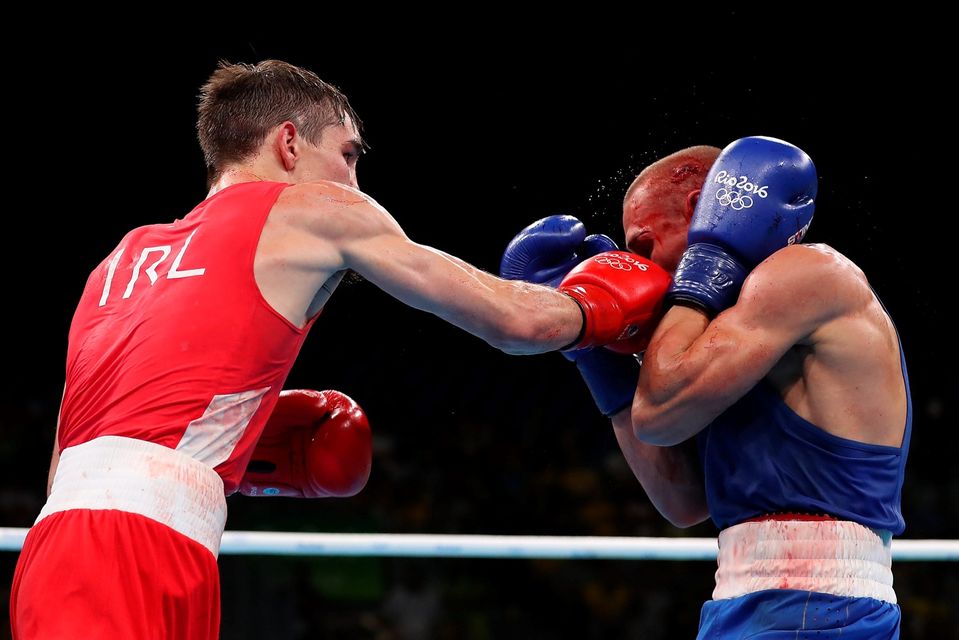 RIO DE JANEIRO, BRAZIL - AUGUST 16:  Michael John Conlan (L) of Ireland fights Vladimir Nikitin of Russia in the boxing  Men's Bantam (56kg) Quarterfinal 1 on Day 11 of the Rio 2016 Olympic Games at Riocentro on August 16, 2016 in Rio de Janeiro, Brazil.  (Photo by Christian Petersen/Getty Images)