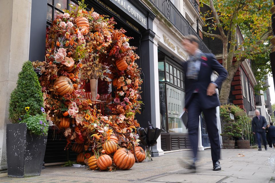 Neill Strain Floral Couture opted for the pumpkin wreath to decorate its storefront (Jonathan Brady/PA)