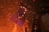 thumbnail: An EU flag is burned on an 11th night Bonfire in the Sandy Row area of Belfast.  PRESS ASSOCIATION Photo. Picture date: Thursday July 12, 2018. Hundreds of bonfires were set to be lit at midnight as part of a loyalist tradition to mark the anniversary of the Protestant King William's victory over the Catholic King James at the Battle of the Boyne in 1690. See PA story ULSTER Bonfires. Photo credit should read: Niall Carson/PA Wire