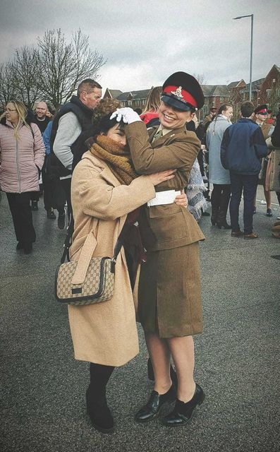 Gunner Beck pictured at her passing out parade with her mother Leighann McCready (Family Handout/PA)