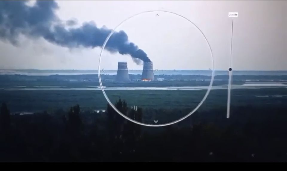 Smoke rises from a cooling tower of the Zaporizhzhia nuclear power station in a Russia-controlled area in the Energodar, Zaporizhzhia region of Ukraine (Ukrainian Presidential Press Office via AP)