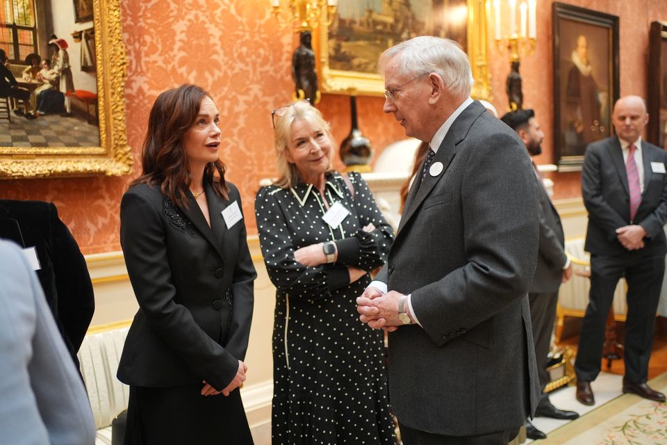 The Duke of Gloucester talks with Ruth Wilson, left, and Fern Britton, centre, during the reception (Yui Mok/PA)