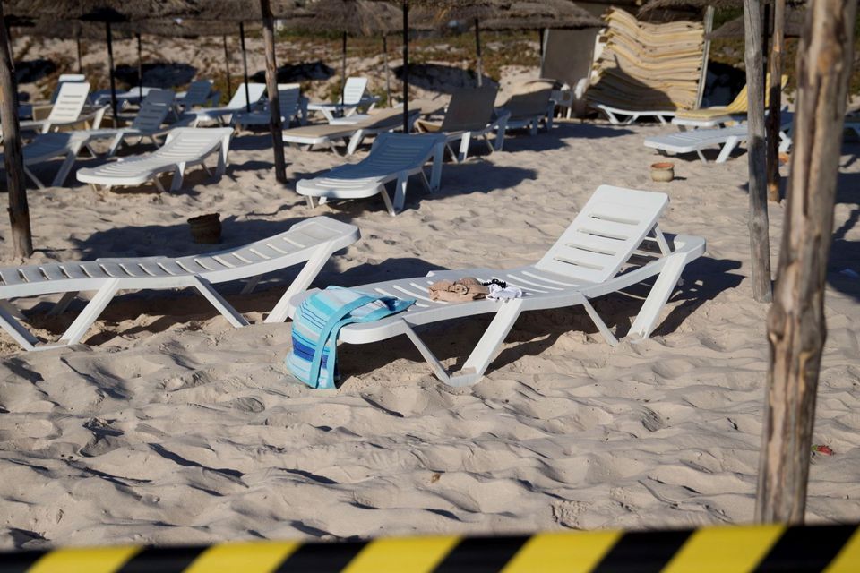 A picture taken on June 27, 2015, shows the cordoned-off beach of the Riu Imperial Marhaba Hotel in Port el Kantaoui, on the outskirts of Sousse south of the capital Tunis, in the aftermath of a shooting attack on the beach resort claimed by the Islamic State group. The IS group on June 27 claimed responsibility for the massacre in the seaside resort that killed nearly 40 people, most of them British tourists, in the worst attack in the country's recent history. AFP PHOTO / KENZO TRIBOUILLARDKENZO TRIBOUILLARD/AFP/Getty Images