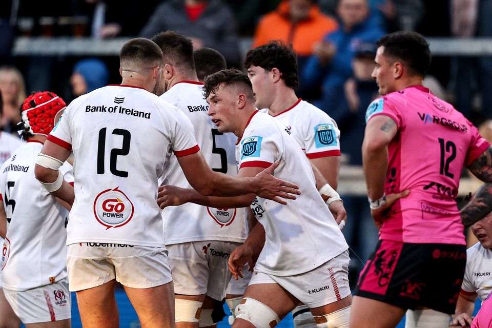 Reuben Crothers is congratulated by his Ulster team-mates after scoring the province’s second try against Benetton