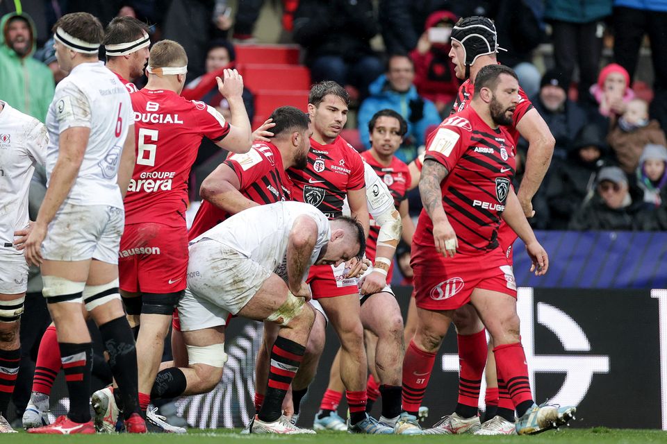 Toulouse's Emmanuel Meafou celebrates scoring a try against Ulster with Antoine Dupont