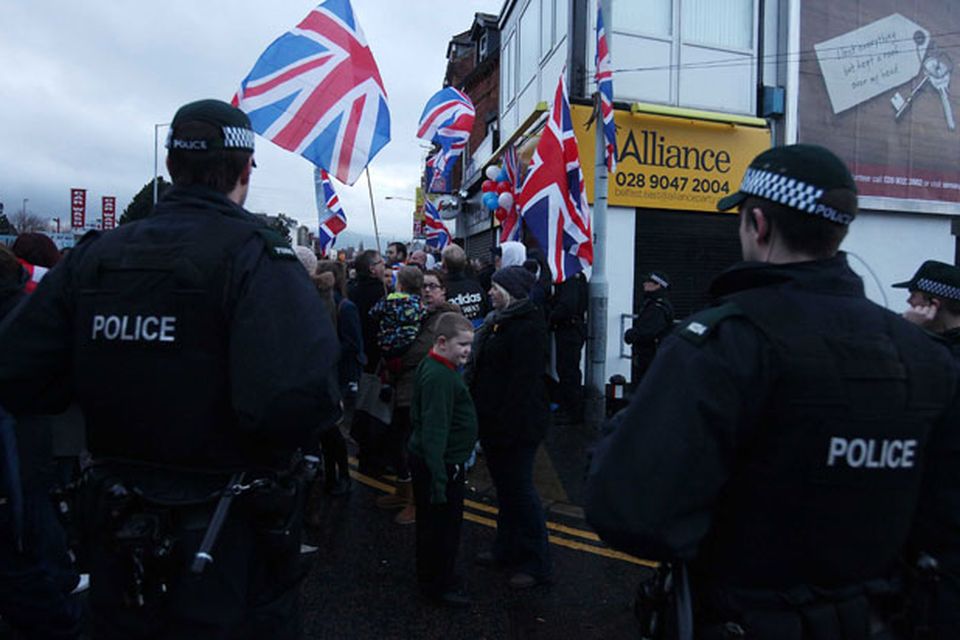 Loyalist hold protest at Naomi Long's east Belfast Alliance office following a council vote last night which will see the Union Flag only follow certain days.