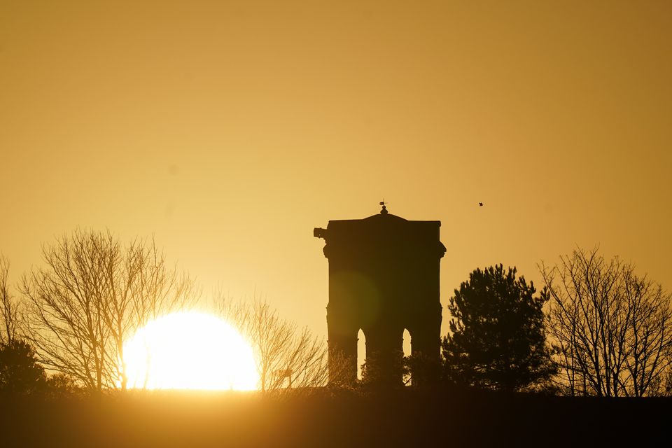 Sunrise over Chesterton Windmill in Warwickshire heralded lower temperatures (Joe Giddens/PA)