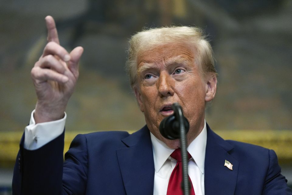 President Donald Trump speaks in the Roosevelt Room of the White House (Julia Demaree Nikhinson/PA)