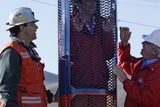 thumbnail: Chile's mining minister Laurence Golborne stands inside a capsule that will be used to rescue trapped miners (AP)
