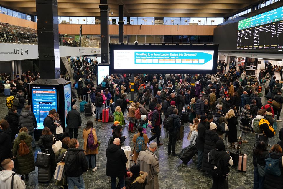 Euston station as people travel to their destinations for the Christmas period (Stefan Rousseau/PA)