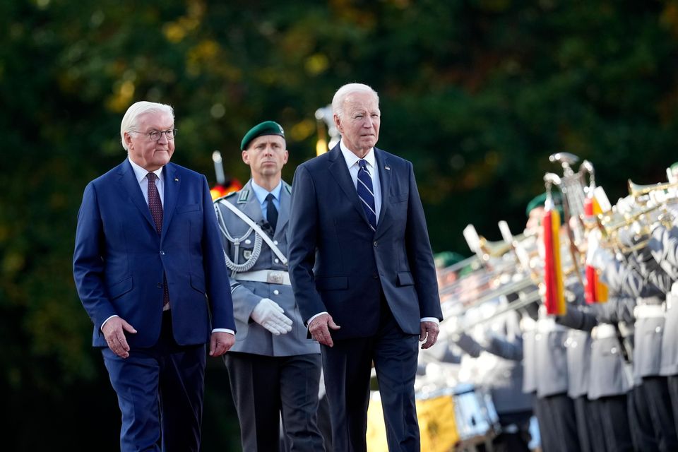 US President Joe Biden and German President Frank-Walter Steinmeier inspect the military honour guard at Bellevue Palace in Berlin (Ebrahim Noroozi/AP)